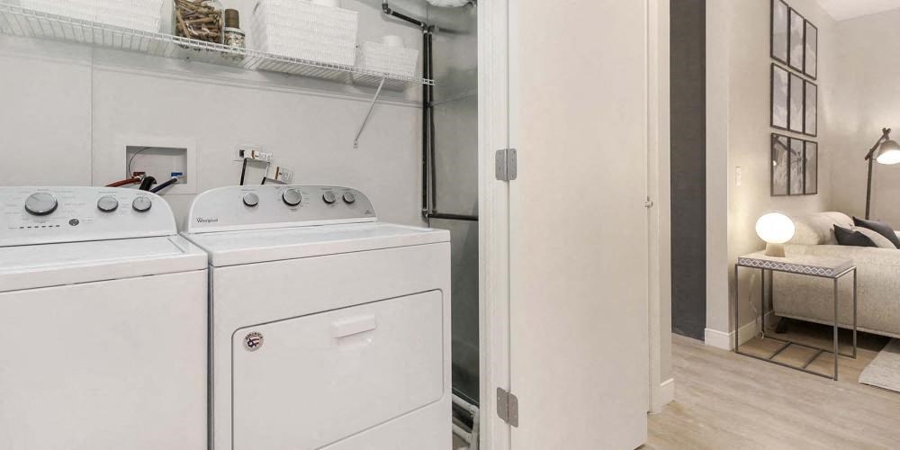 a white washer and dryer in a room next to a closet at Clarendon Hills 229, Clarendon, 60514