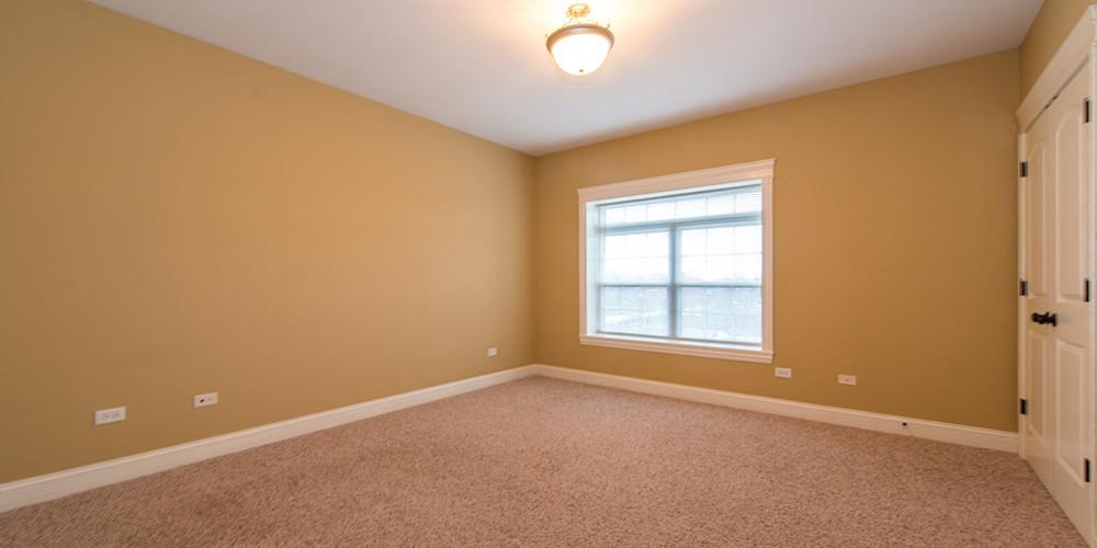 an empty room with a window and a door at Countryside 10765, Countryside, Illinois