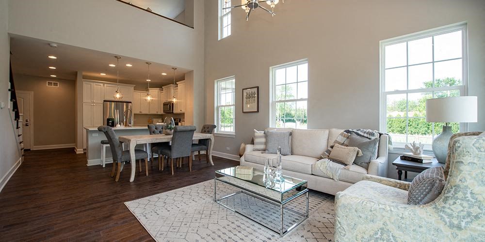 a living room with a couch and a table at Countryside Townhomes, Countryside, IL