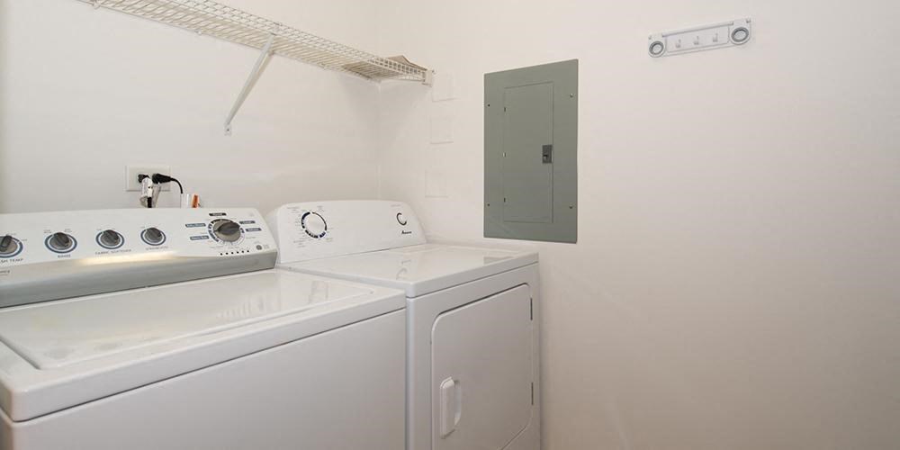 a white washer and dryer in a white room  at Countryside 10765, Countryside, IL, 60525