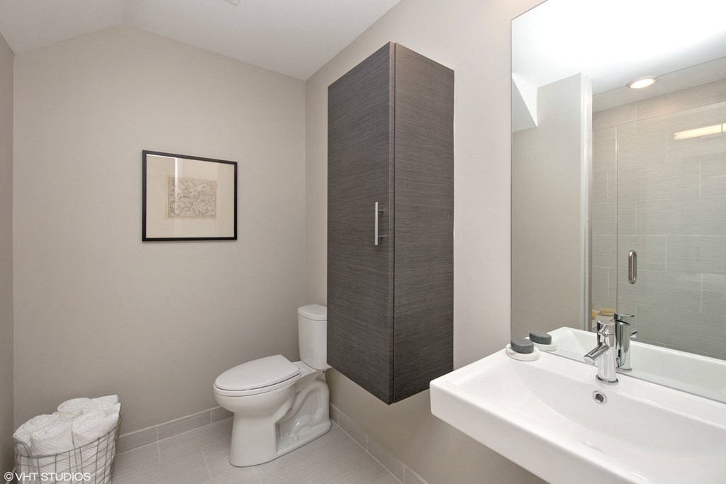 a bathroom with a toilet sink and a shower at Clarendon Hills 229, Illinois, 60514