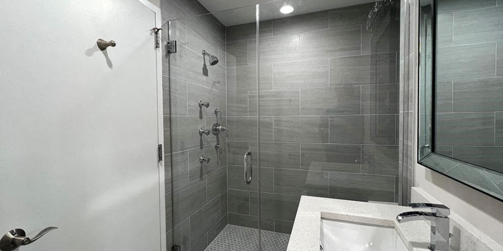 a bathroom with a shower and a sink  at Lavergne 4810, Chicago