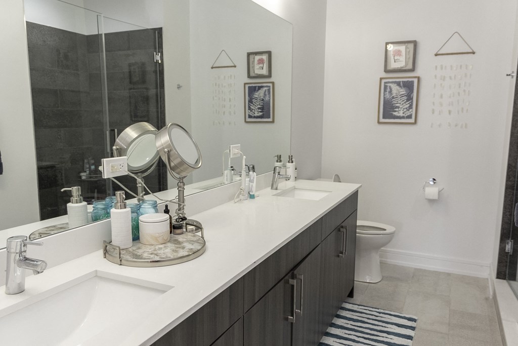 a bathroom with two sinks and a mirror at Talman 1554, Chicago, IL