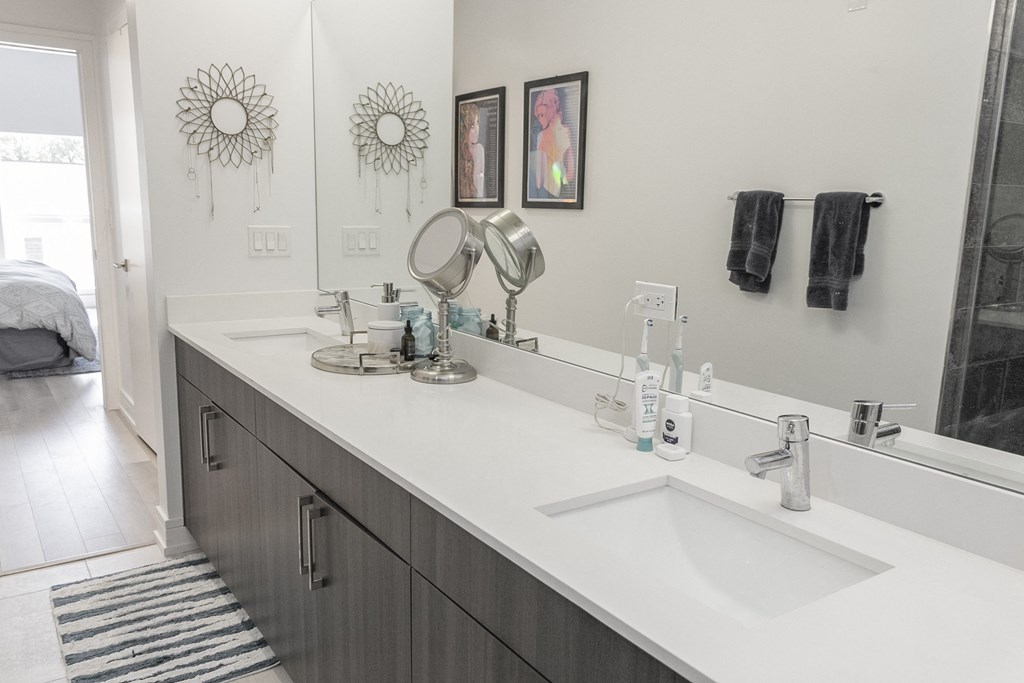 a bathroom with two sinks and a mirror at Talman 1554, Chicago Illinois
