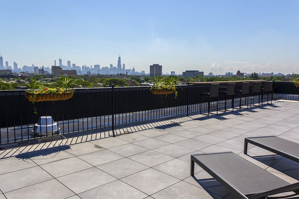 the view of the city from the roof deck of a building at Talman 1554, Chicago, 60622