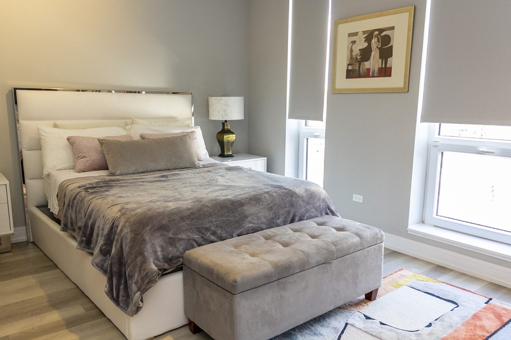 a bedroom with a bed and a and a window at Talman 1554, Chicago, IL 60622