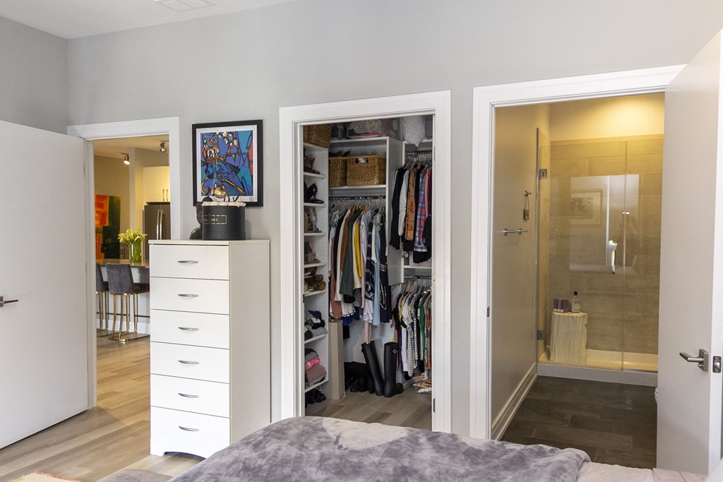 a bedroom with a closet and a bathroom with a shower at Talman 1554, Chicago