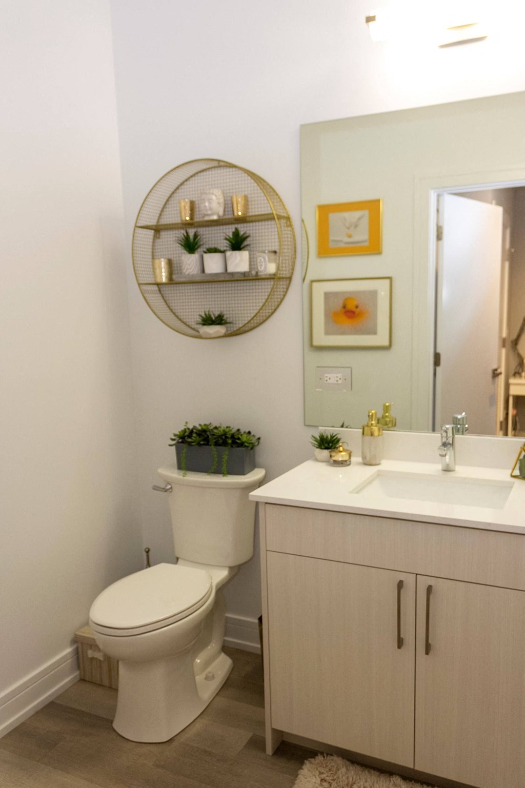 a small bathroom with a toilet and a sink and a mirror at Talman 1554, Chicago, 60622
