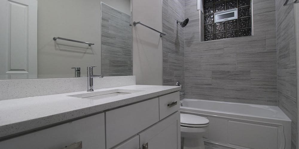a white bathroom with a sink and a toilet  at Elston 3434, Chicago, IL, 60618