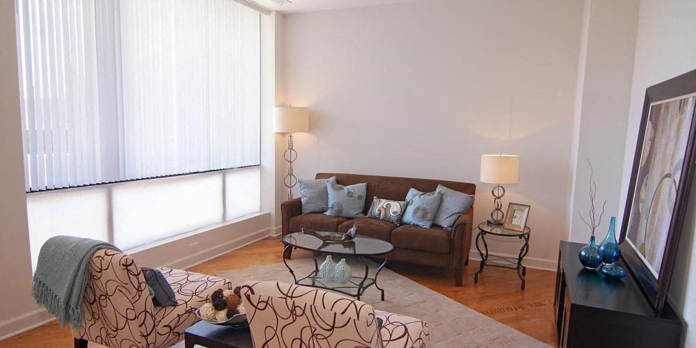 a living room with a couch and a table  at Lavergne 4810, Illinois, 60630