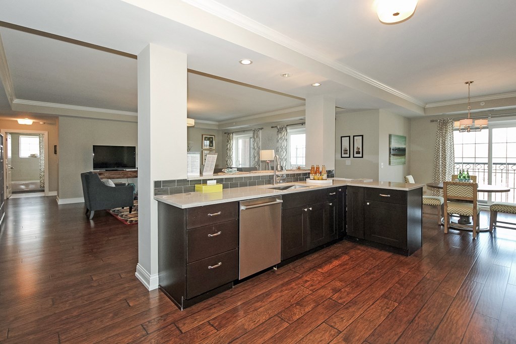 a kitchen with a center island and a living room  at Countryside 10765, Countryside, IL, 60525
