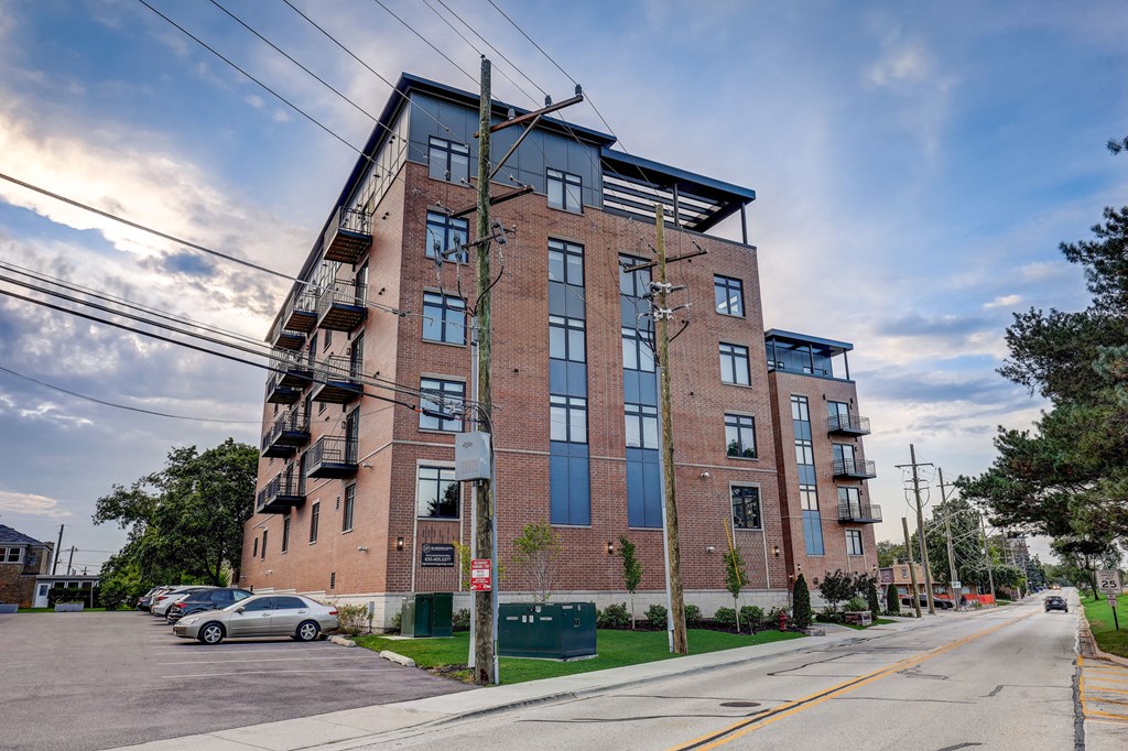 a brick apartment building on the corner of a street at Highwood 440, Illinois