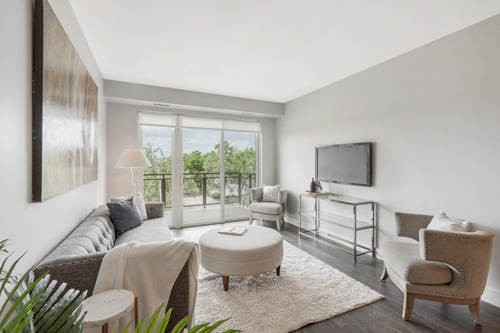 a living room with a couch and a tv at Barrington 101, Barrington Illinois