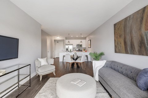 a living room with a couch and a table at Barrington 101, Barrington, IL