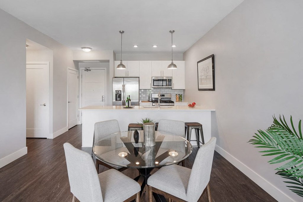 a kitchen and dining room with a glass table at Barrington 101, Barrington, 60010