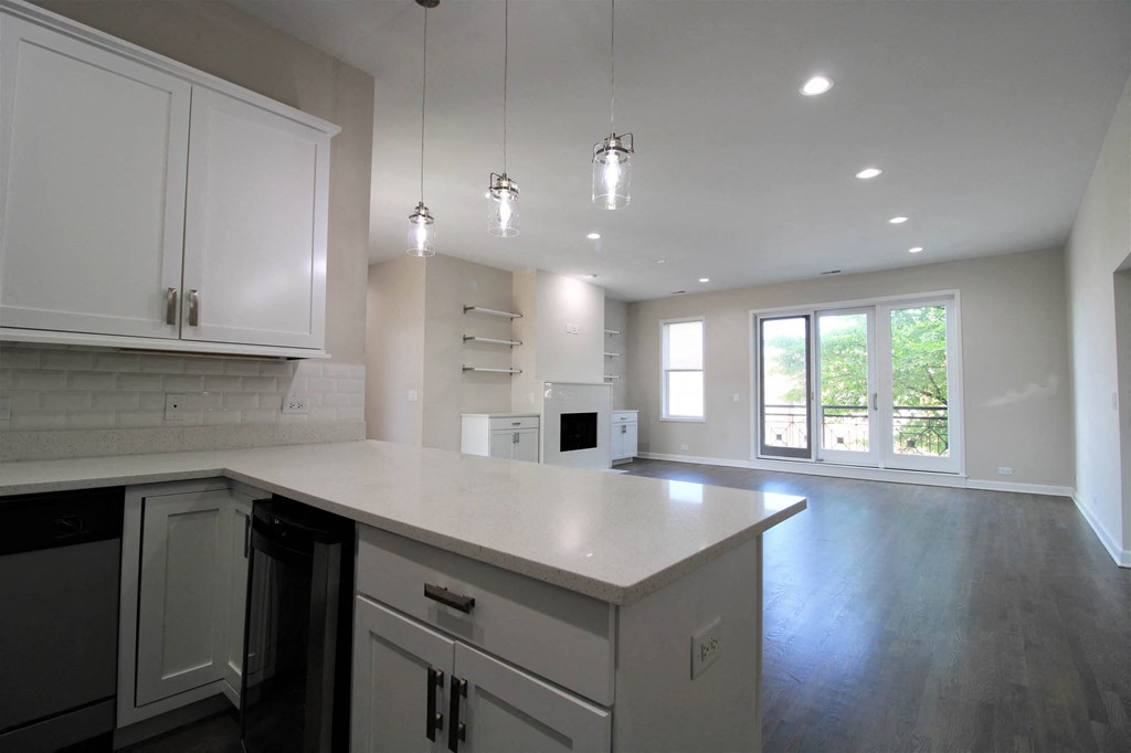 a kitchen with white cabinets and a white counter top  at Elston 3434, Illinois, 60618