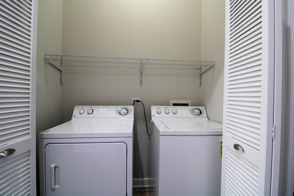 a laundry room with two washes and a dryer  at Elston 3434, Chicago, IL