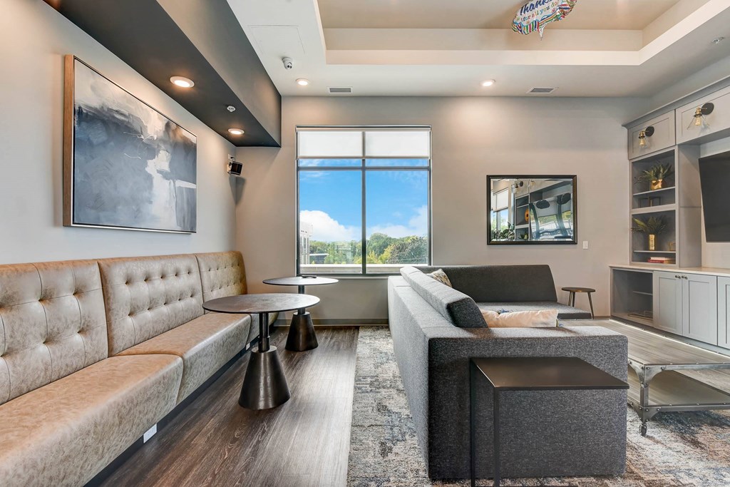 a living room with couches and a window at Barrington 101, Barrington, IL
