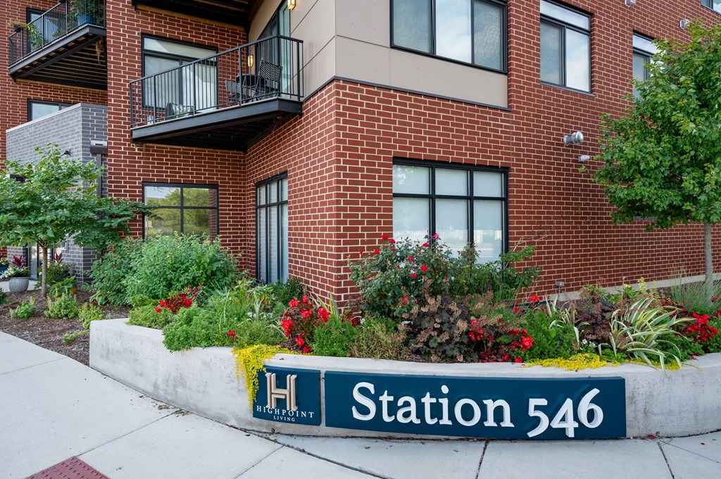 A brick building with a sign that says Station 546.