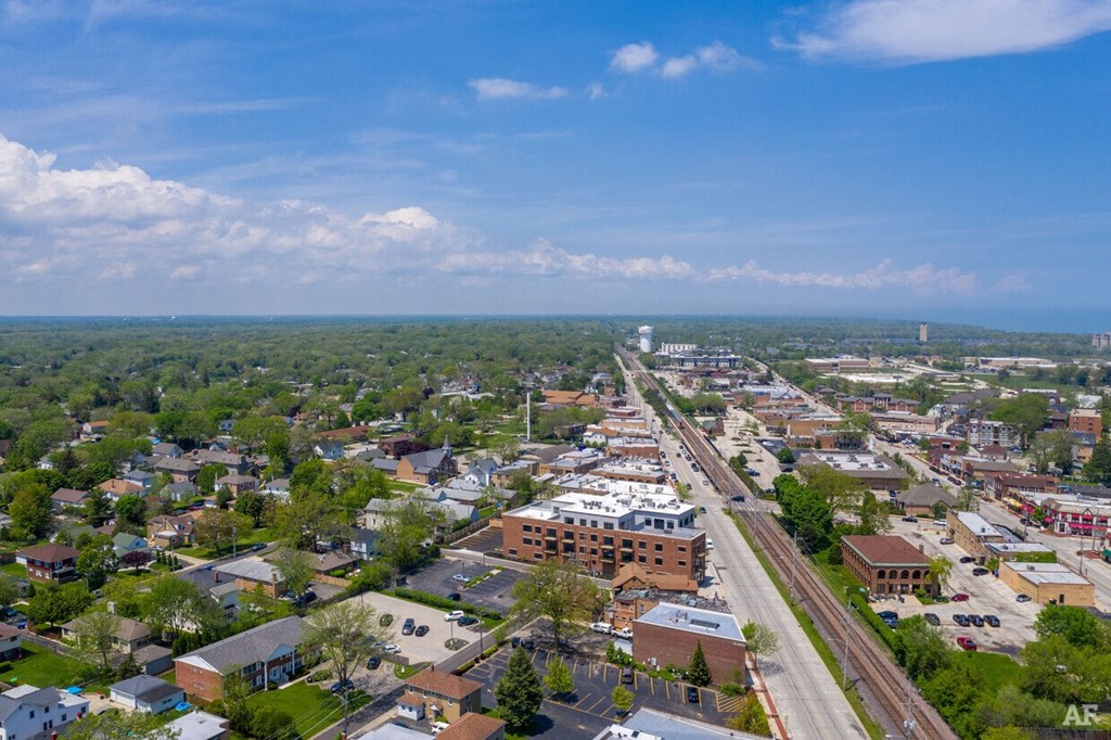 an aerial view of a city with train tracks and buildings  at Highwood 246, Illinois, 60040