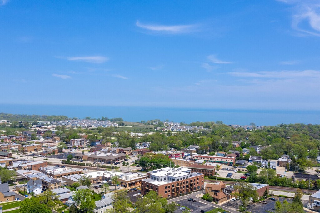 an aerial view of a city with the ocean in the background  at Highwood 246, Highwood