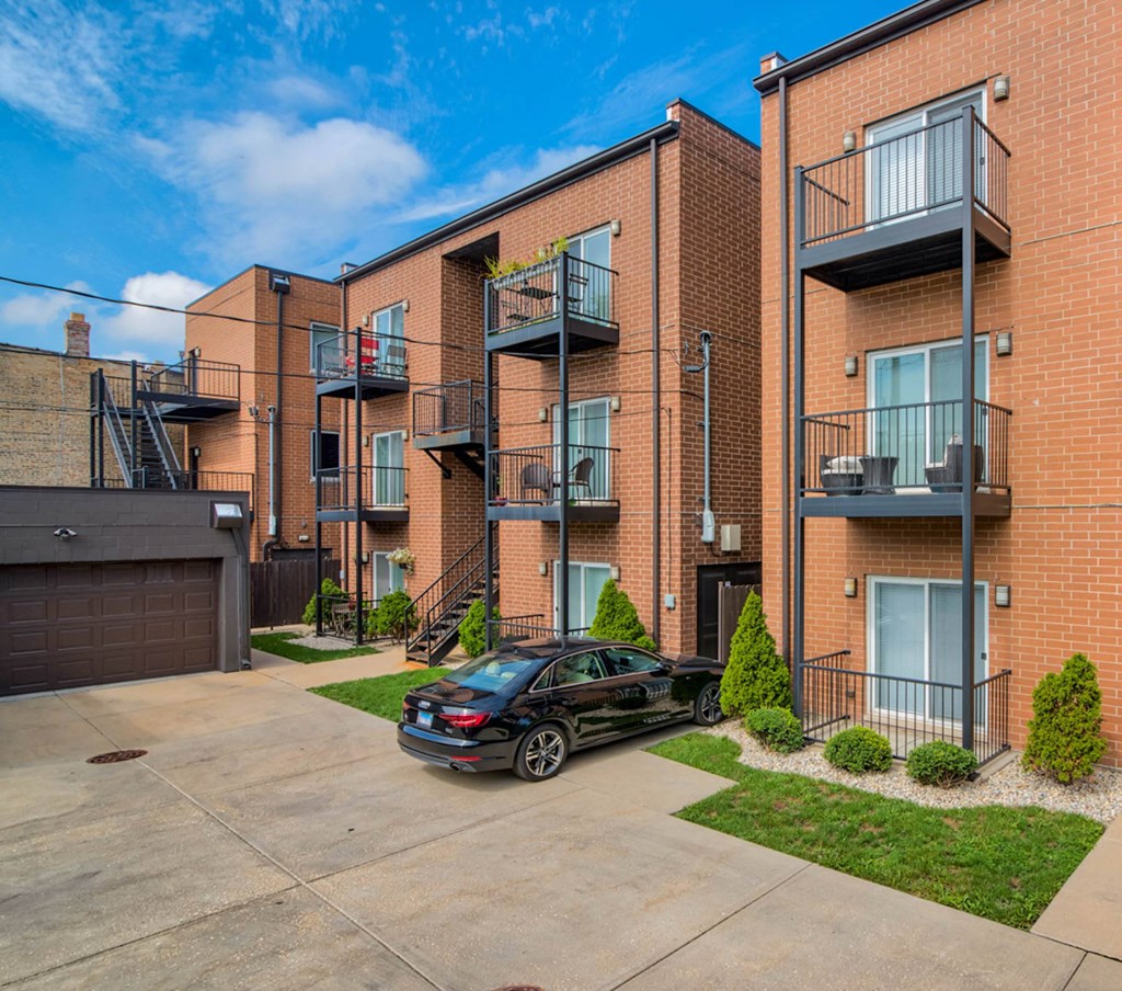 a car parked in front of an apartment building at Montrose 3634, Chicago, 60618