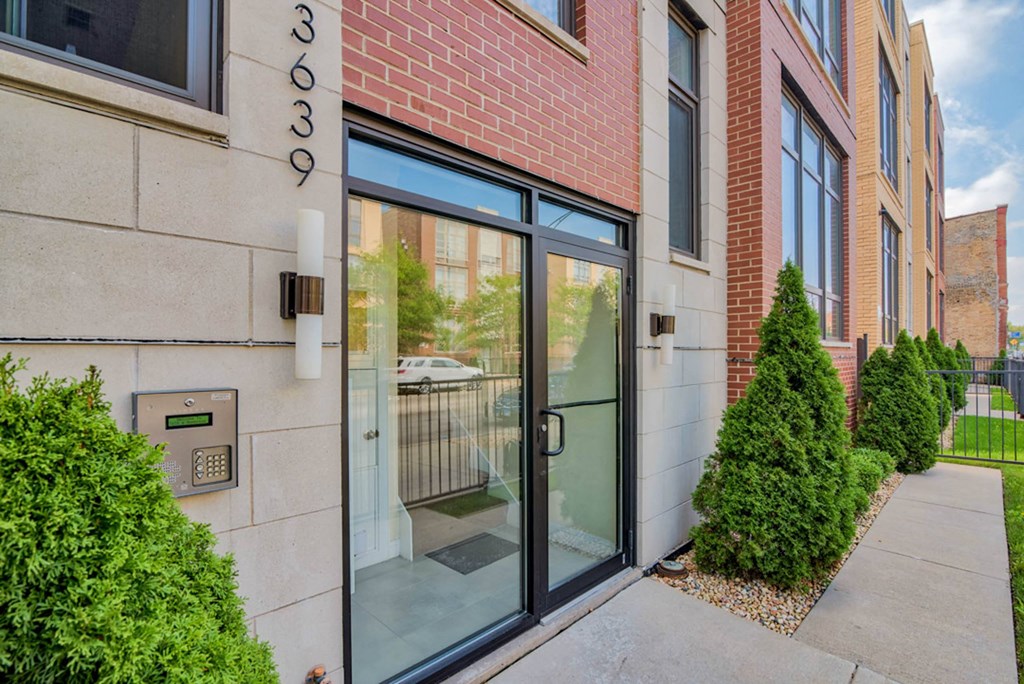 the entrance to a building with glass doors at Montrose 3634, Illinois
