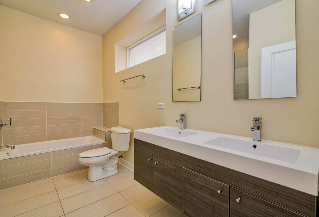 a bathroom with a sink toilet and a bath tub at Montrose 3634, Chicago, IL
