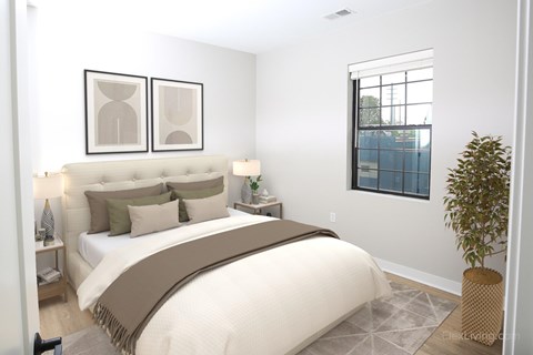 A bedroom with a large bed and two framed pictures on the wall.