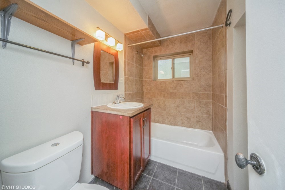 Bathroom with a full size tub at 1355 Pearl in Denver, CO