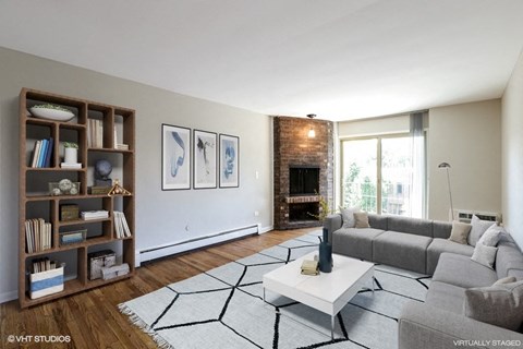 a living room with a couch and a coffee table