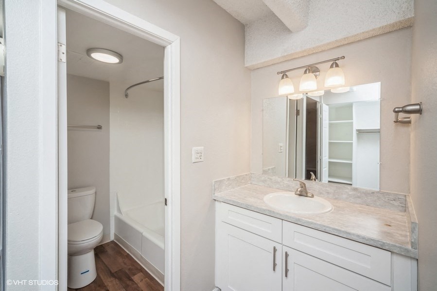 Bathroom with vanity storage at 878 S Dexter St in Denver, CO