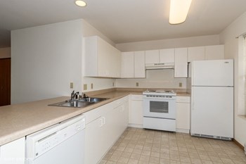 Bright white kitchens at Westminster Senior Apartment Homes Bright white kitchens at Westminster Senior Apartment Homes - Photo Gallery 4