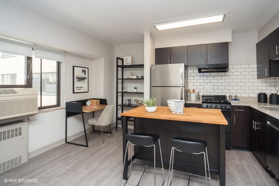 Upgraded appliances and modern finishes - The Prelude Studio