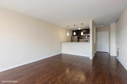 Spacious living area with upgraded flooring