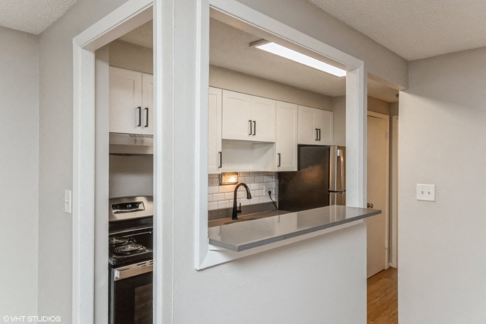 Renovated open kitchen with a breakfast bar