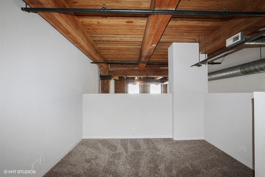 Unique bedroom space with genuine wood ceilingsat Carriage House Lofts, Chicago