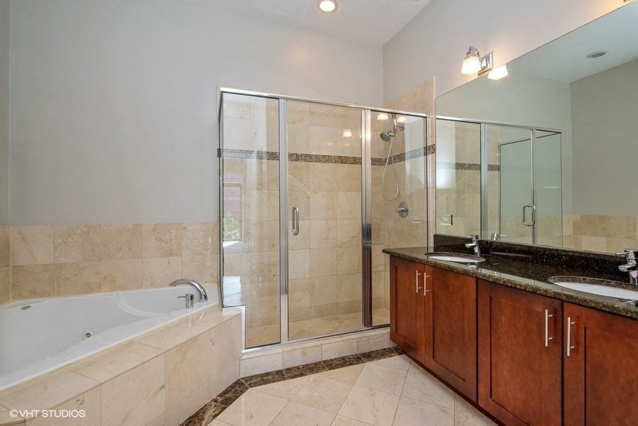 Luxurious bathroom with double sinks, garden tub and walk in shower - 2 Bedroom