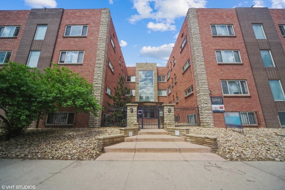 1355 Pearl located in Capitol Hill. A view of the front side of the property is shown here in beautiful daylight