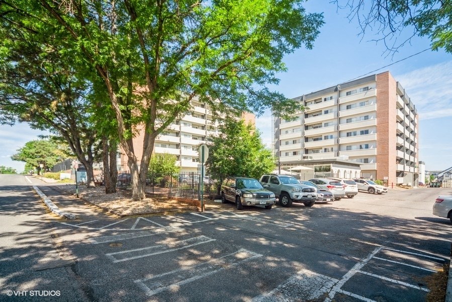 Parking lot with ample parking at 878 S Dexter St in Denver, CO