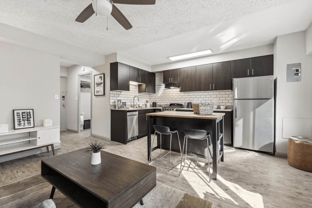 Archer Tower apartment living room and kitchen at Archer Tower in Denver, CO