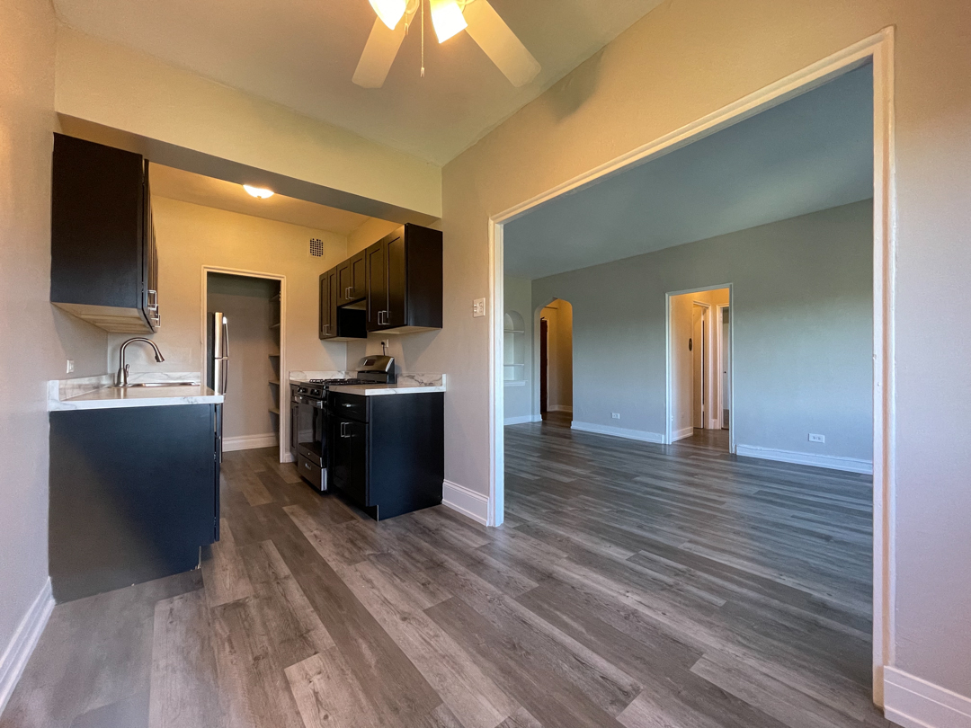Spacious Dinning Nook Between Kitchen and Living Areas at 1033 W Loyola, Chicago, IL