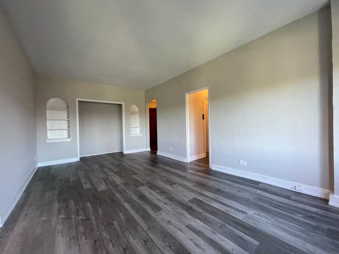 Plank-Style Flooring in Living Room at 1033 W Loyola, Chicago, IL, 60626