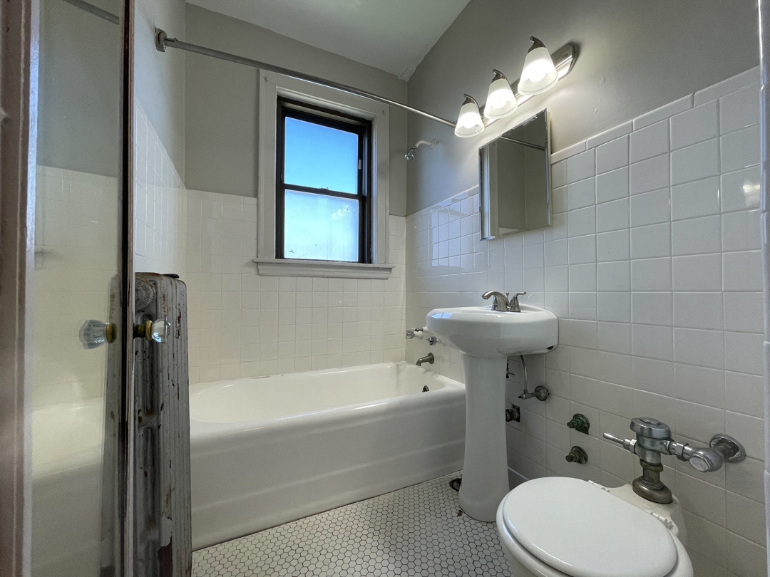 White Bathroom with Character at 1033 W Loyola, Chicago, Illinois