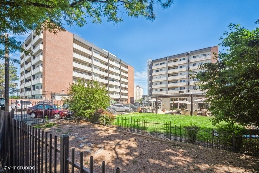 Fenced in pet park for your furry friends at 878 S Dexter St in Denver, CO