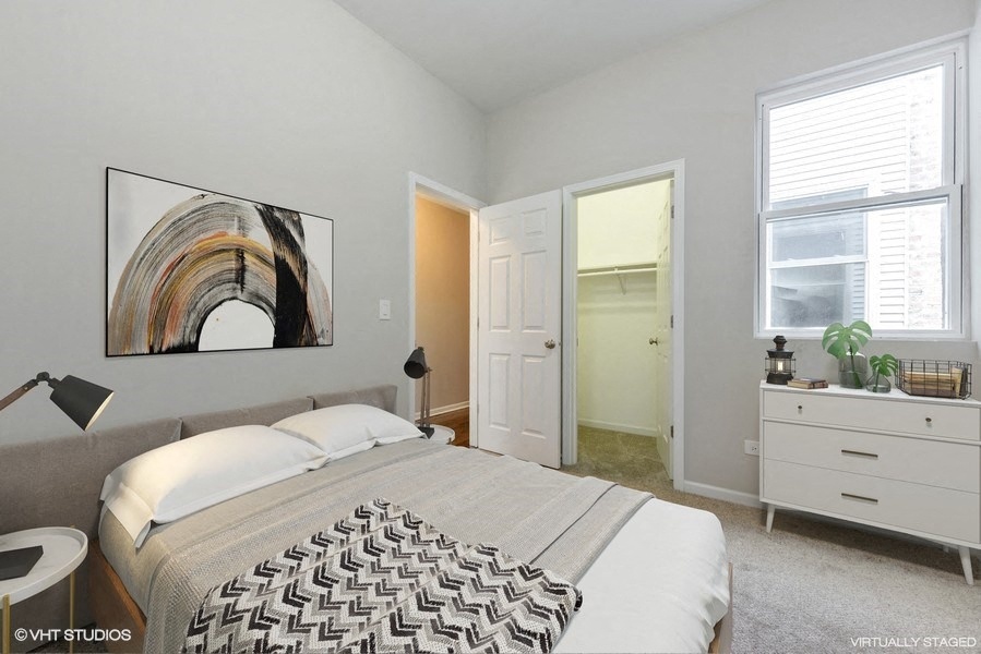 Bright bedroom with a large closet