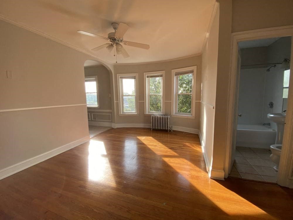 Living area with tons of windows to enjoy the city views - George Spoor Studio