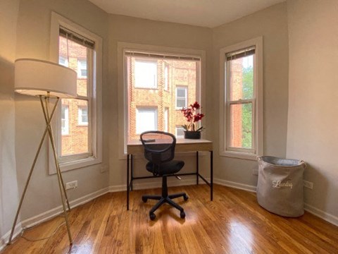 Hardwood flooring and large windows