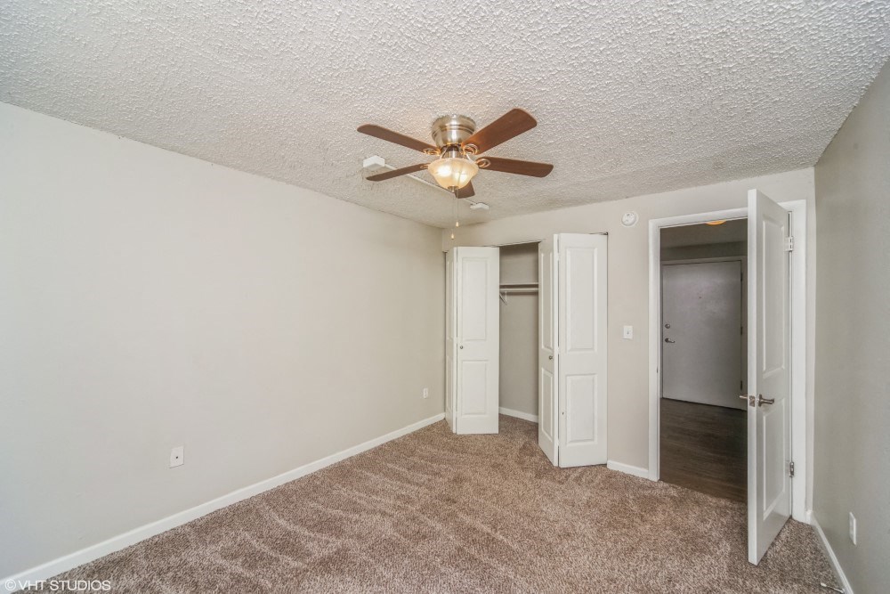 Bright bedroom with a large closet