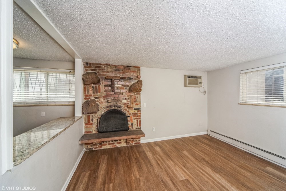 Living room with nice wood-like flooring